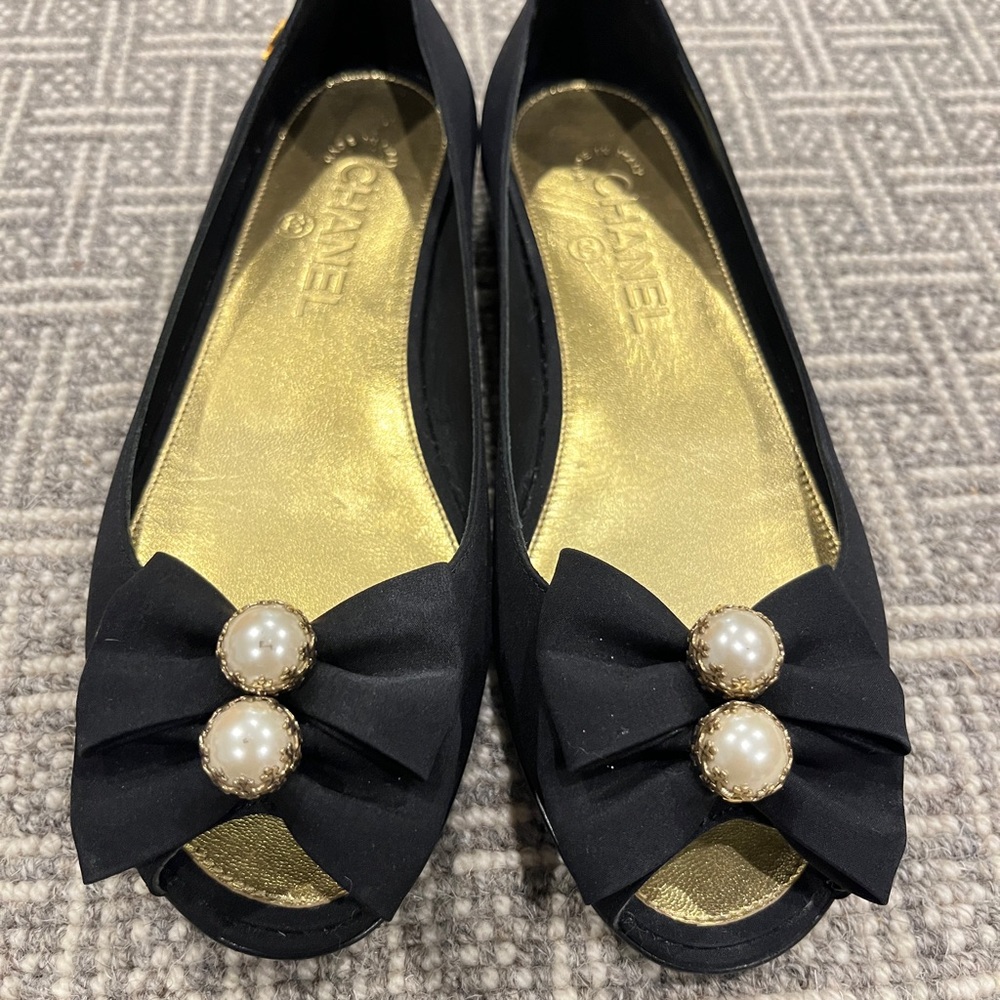 CHANEL Black Flats with Pearl Accents